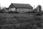 The barn which was ringed with barbed wire
